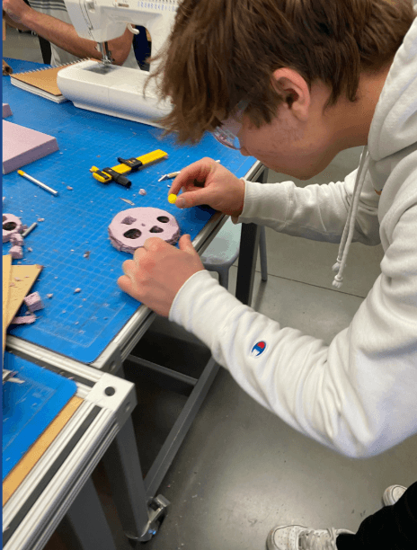 Ball displacement mechanism